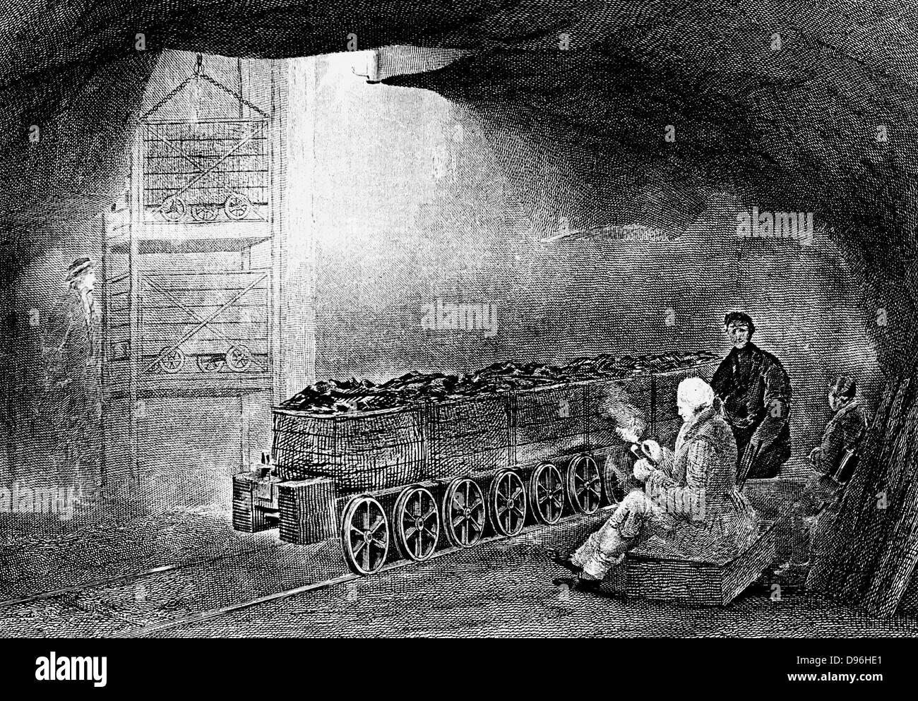 Coal Mining : Bottom of  pit shaft with train of wagons waiting to be hoisted to surface.  Flanged wheels on coal wagon.  From W Fordyce 'A History of Coal, Coke, Coal Fields ...' London, 1860. Engraving. Stock Photo
