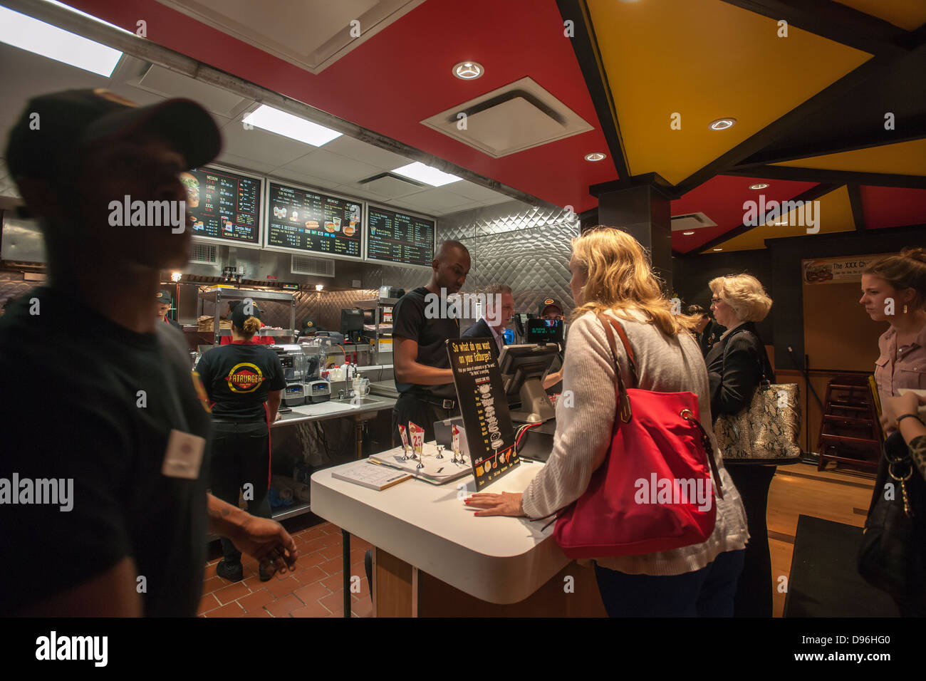 Burger lovers from far and wide descend on the new Fatburger restaurant in the Murray Hill neighborhood of New York Stock Photo