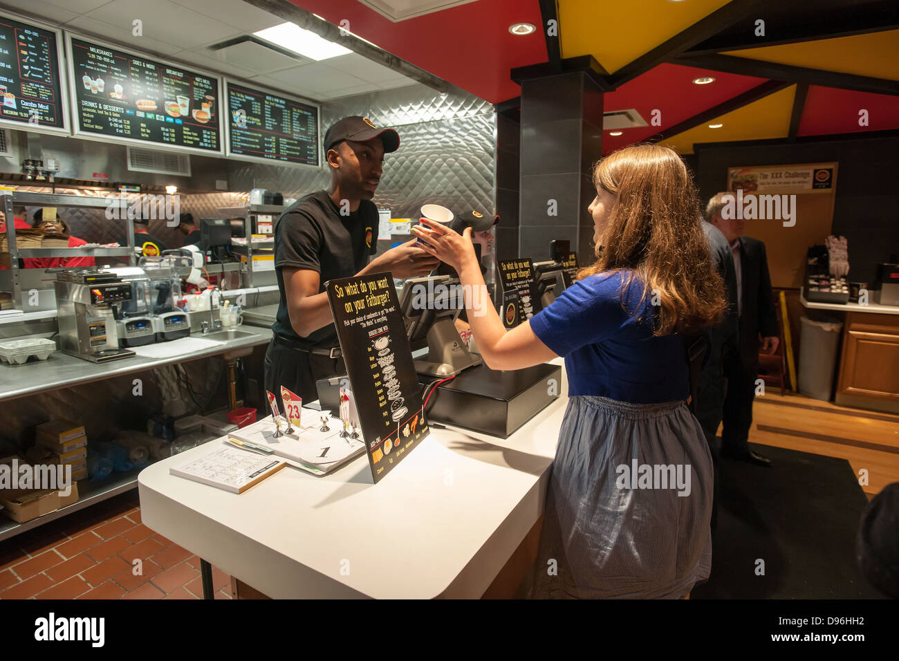 Burger lovers from far and wide descend on the new Fatburger restaurant in the Murray Hill neighborhood of New York Stock Photo