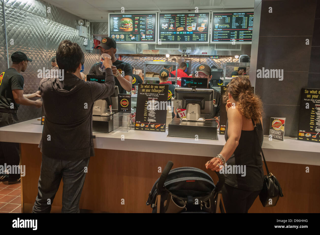 Burger lovers from far and wide descend on the new Fatburger restaurant in the Murray Hill neighborhood of New York Stock Photo