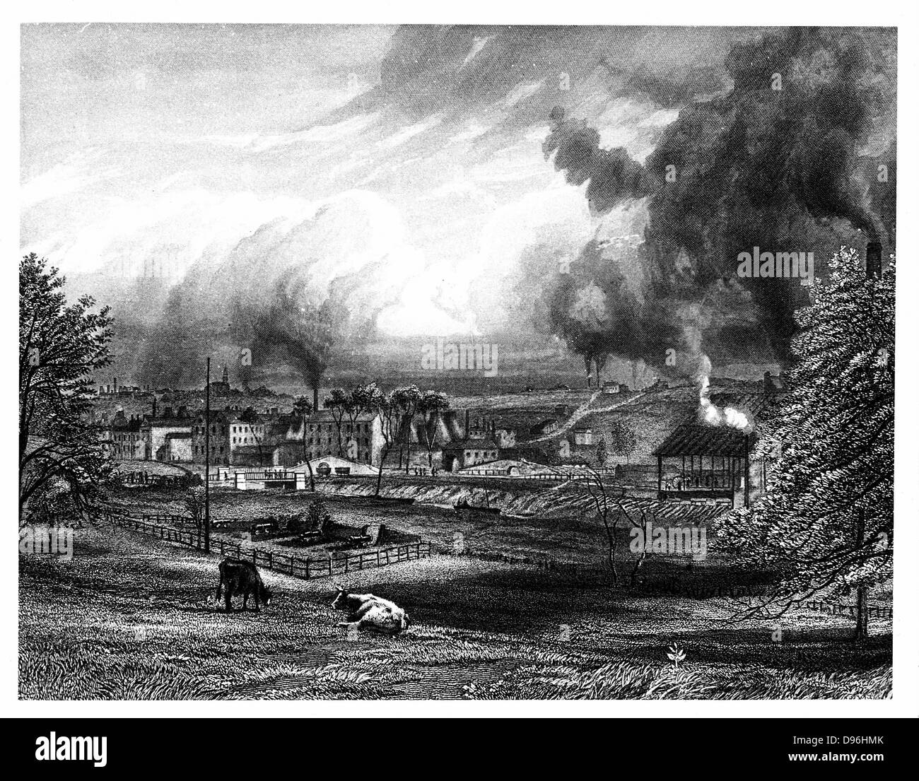 Josiah Wedgwood's (1730-1791) factory, Etruria, Hanley, Staffordshire, England. The Etruria Canal, constructed in order to transport finished wares from the potteries,  is visible below the embankment in the centre of the image. Engraving. Stock Photo