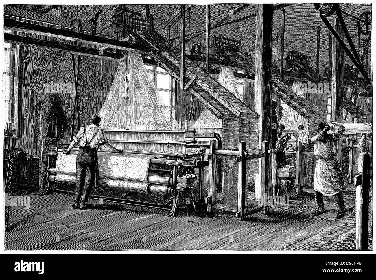 Weaving shed fitted with Jacquard power looms.   Swags of punched cards carrying pattern being woven are at right and above each loom.  Illustration Paris c1880 Stock Photo