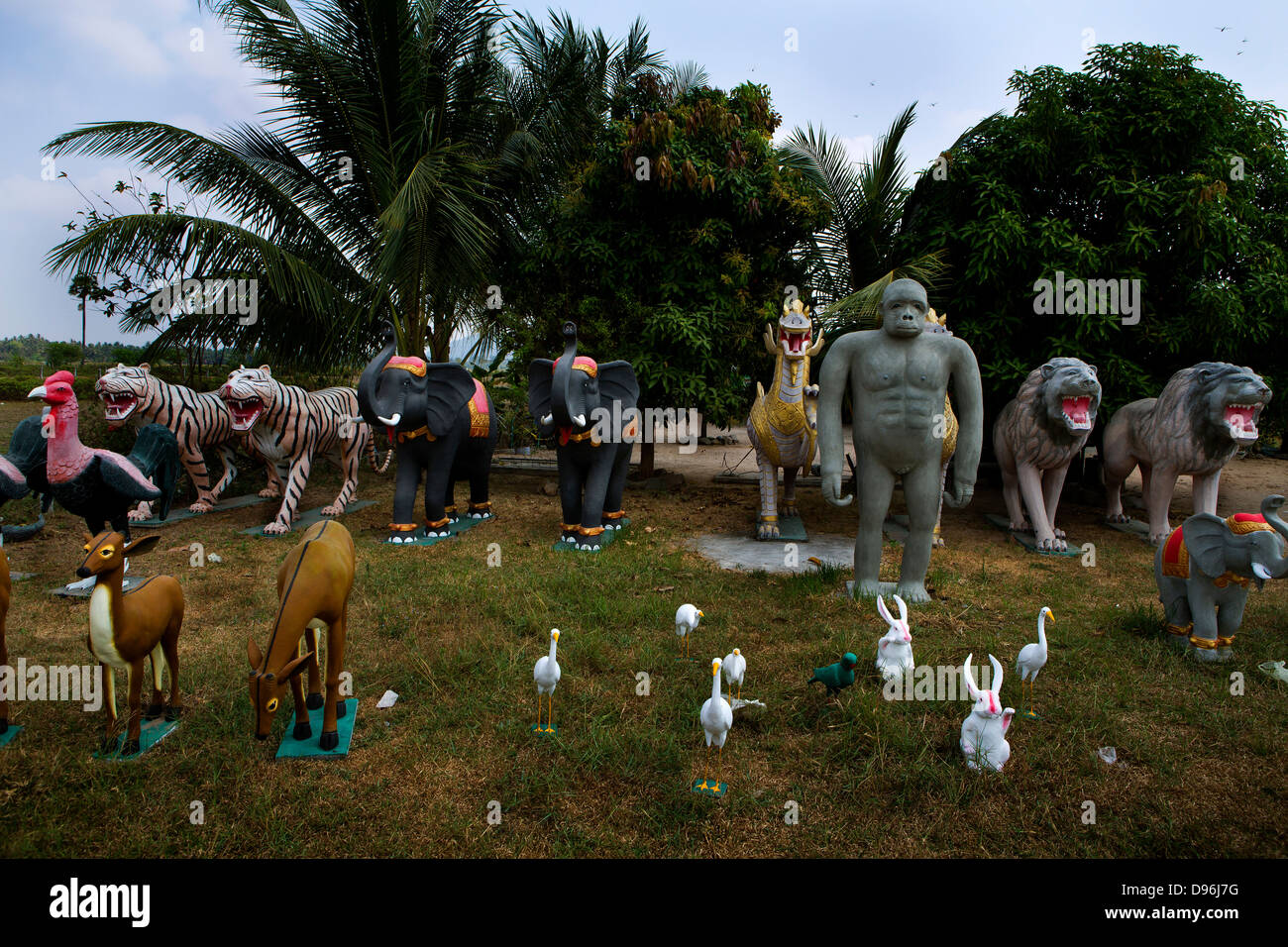 Plaster animals for sale in a roadside shop, Along Veng, Angkor temple complex, Thailand Stock Photo