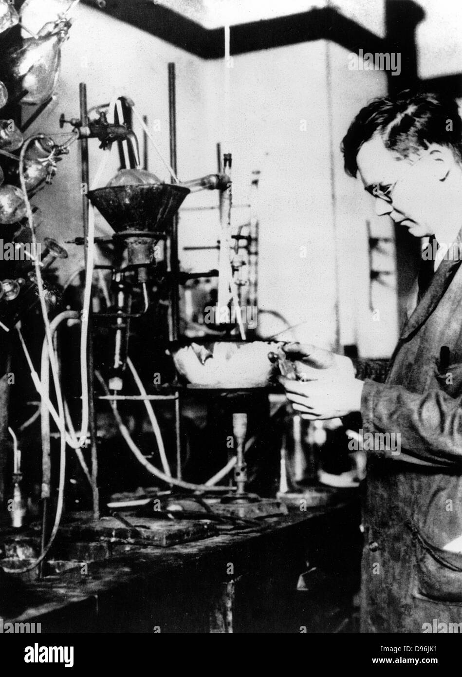 Wallace Hume Carothers (1896-1937) in the laboratory. Discovered of nylon while working for Dupont Company, 1927. American industrial chemist. Courtesy Du Pont Company Stock Photo