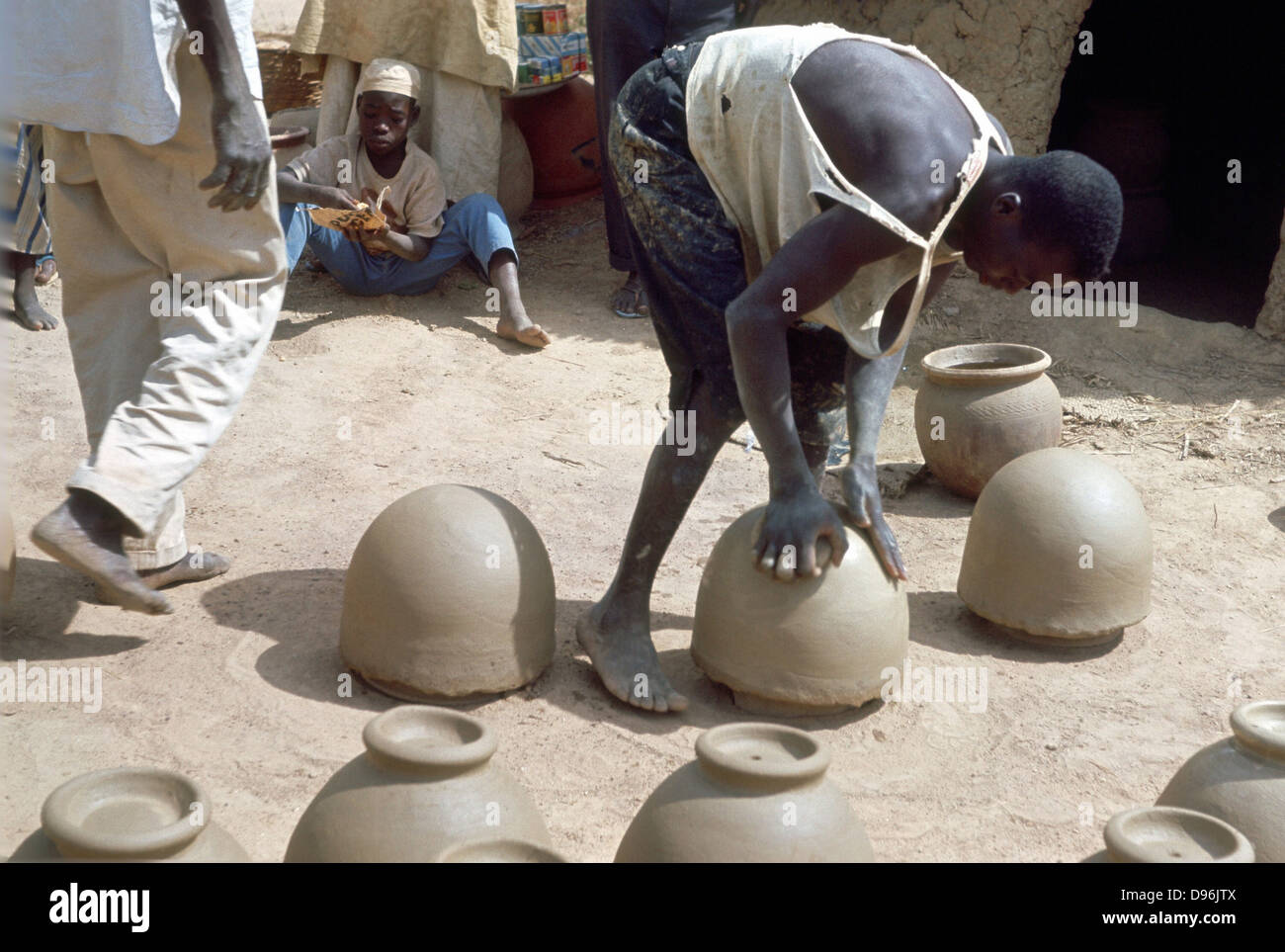 Making pots without a wheel. Nigeria c1966. Landscape format Stock