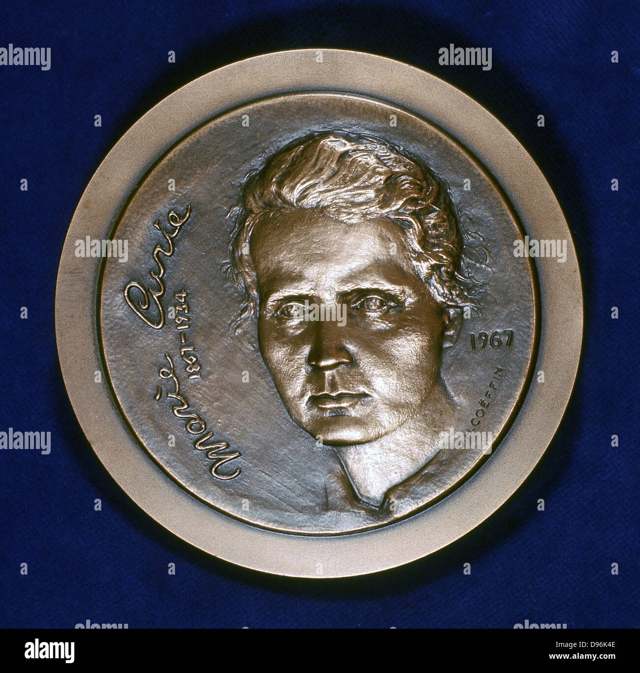 Marie Sklodowska Curie (1867-1934) Polish-born French physicist. Obverse of medal issued in 1967 to commemorate the centenary of her birth and celebrating the isolation of Polonium and Radium which she achieved in 1898 Stock Photo