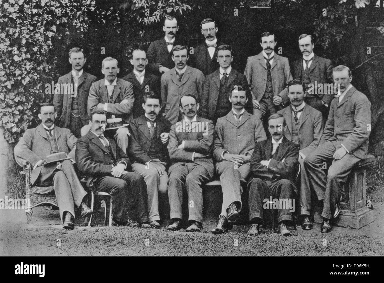 JJ (Joseph John) Thomson (1856-1940) British Nuclear physicist, discovered electron, here with his research students at the Cavendish Laboratory, Cambridge, in 1898. Left to right, back: SW Richardson, J Henry. Middle: EBH Wade, GA Shakespear, CTR Wilson, Ernest Rutherford, W Craig-Henderson, JH Vincent, GB Bryan. Front: J McClelland, C Child, Paul Langevin, JJ Thomson, J Zeleny, RS Willows, HA Wilson, JSE Townsend. Stock Photo