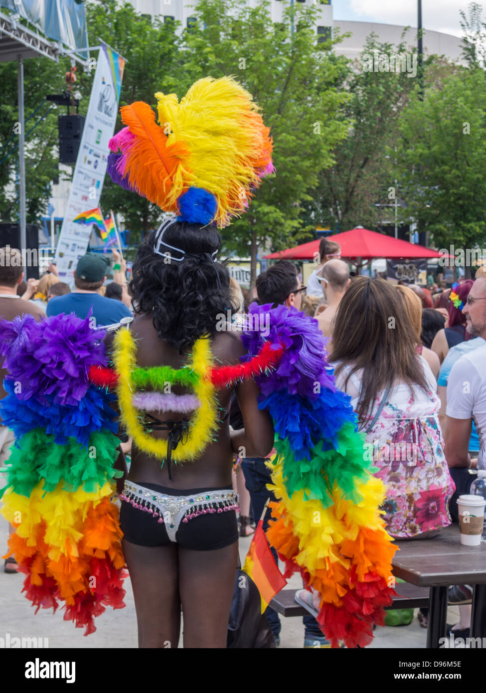 transsexual African American woman wearing pride colored decorations in Edmonton pride festival Stock Photo