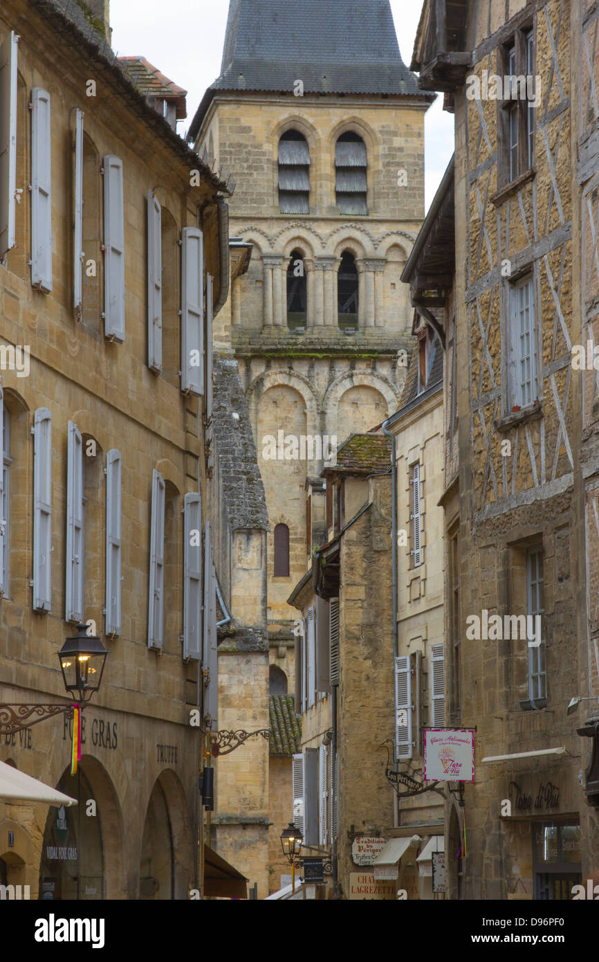 Beautiful medieval sandstone buildings and bell tower of Saint-Sacerdos Cathedral in charming Sarlat, Dordogne region of France Stock Photo