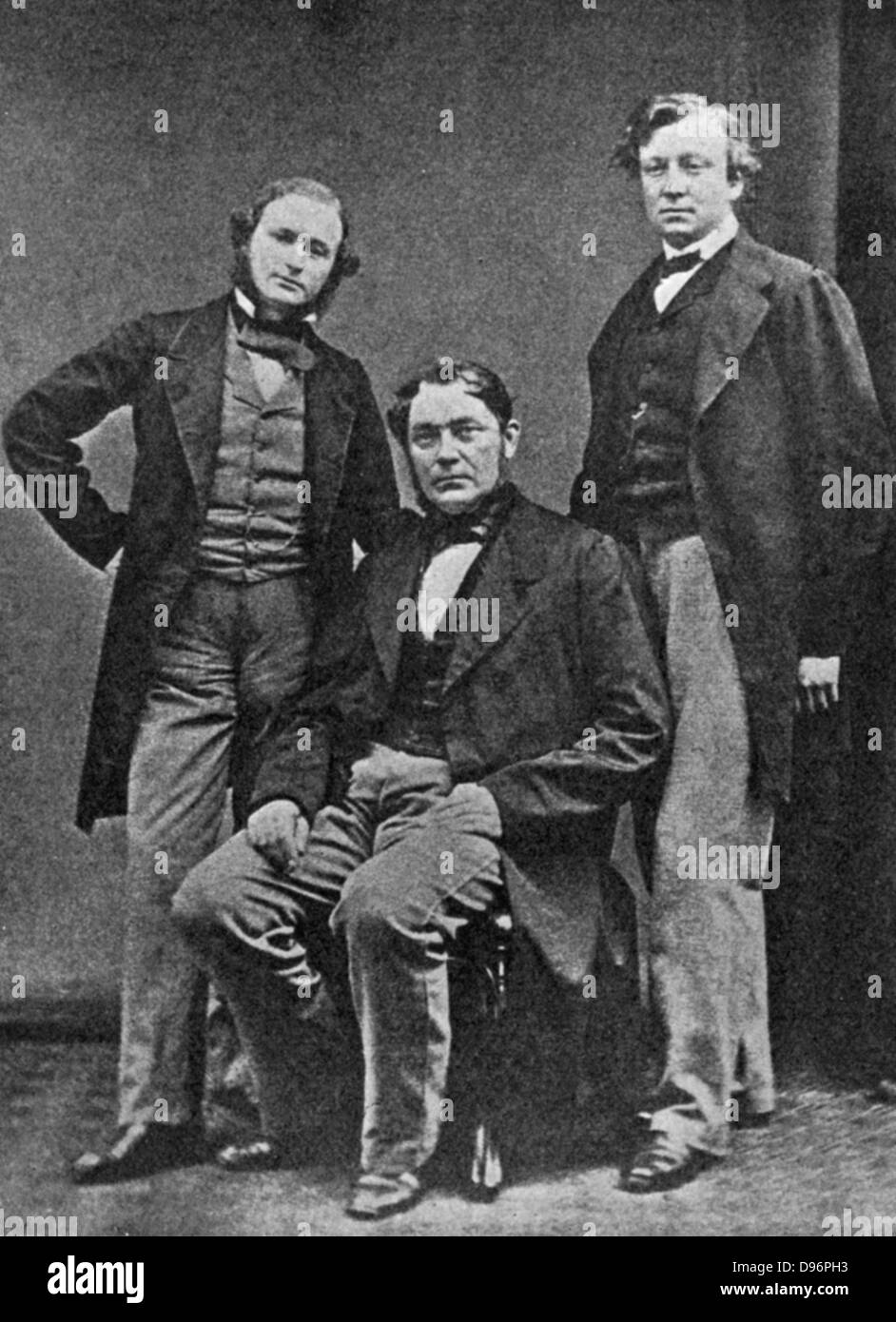 From left to right, chemists and physicists: Kirchhoff, von Bunsen and Roscoe c1860.  Gustave Robert Kirchhoff, German physicist (1824-1887), Robert Wilhelm Eberhard von Bunsen, German Physicist and chemist (1811-1899) and Sir Henry Enfield Roscoe, English Chemist, (1833-1915). From 'History of Chemistry', by Edward Thorpe. (London, 1910). Stock Photo
