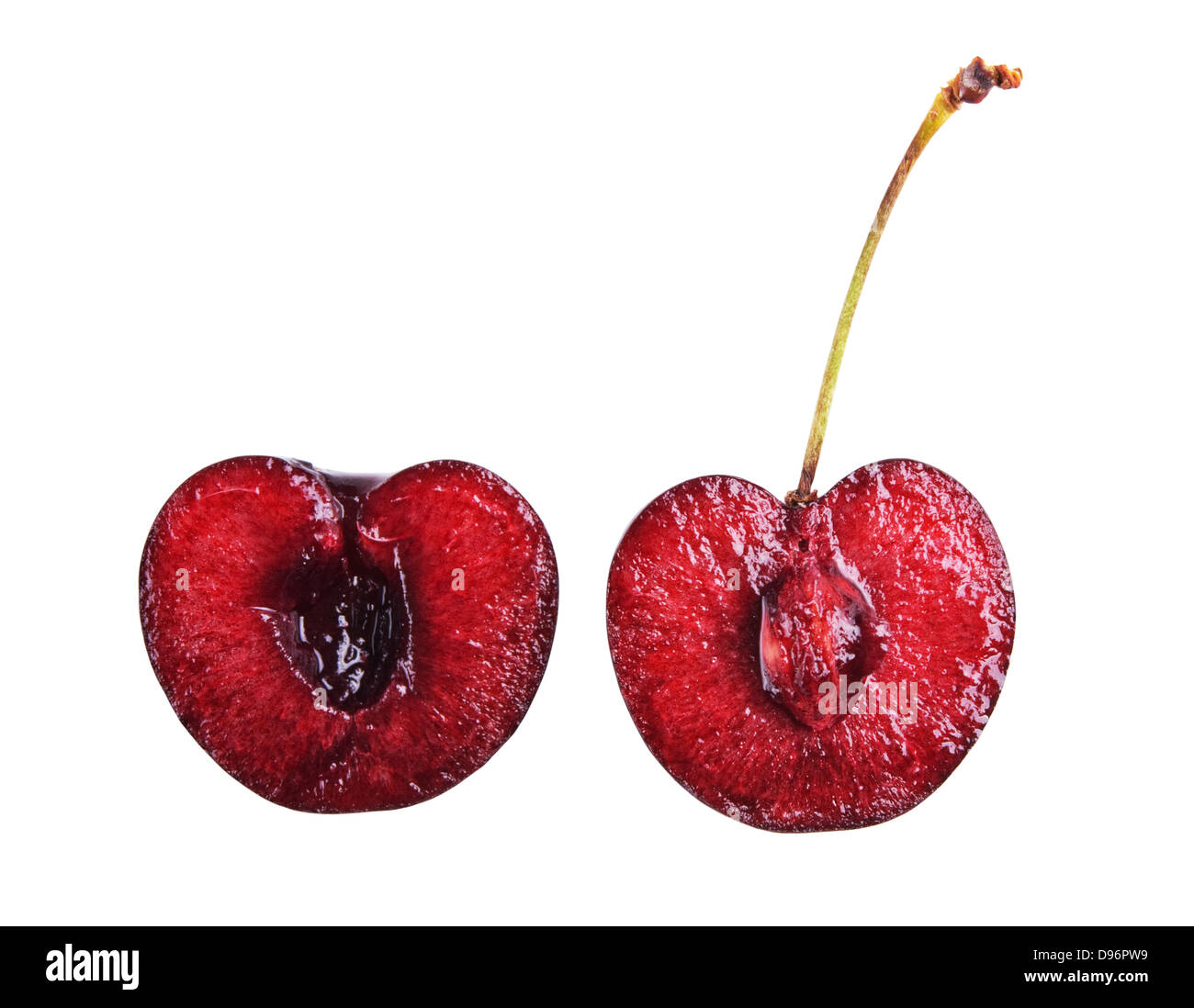 fresh cherry cut in halves isolated on white Stock Photo