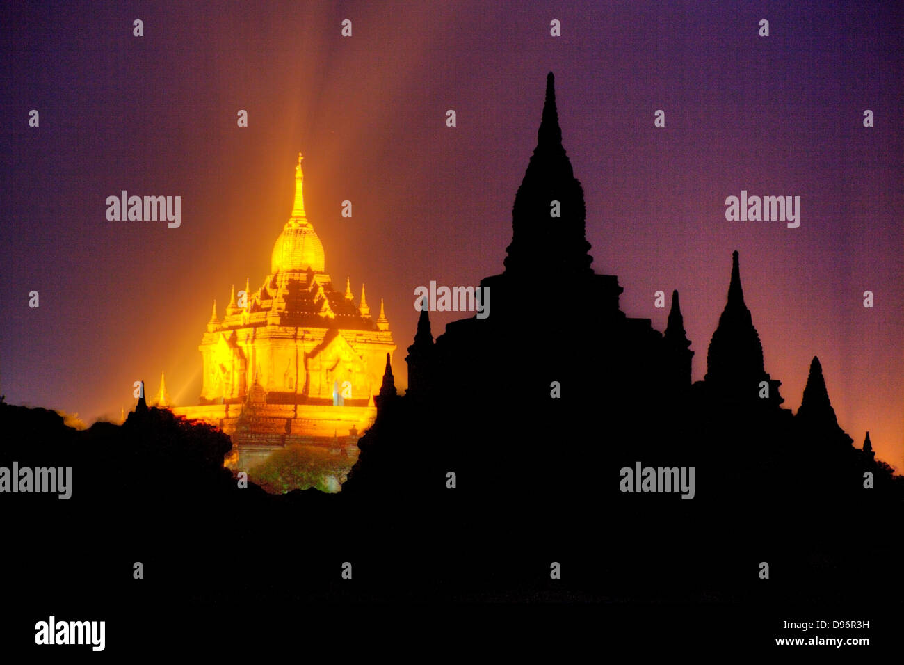 The ANANDA TEMPLE is lit like a jewel at night - BAGAN, MYANMAR Stock Photo