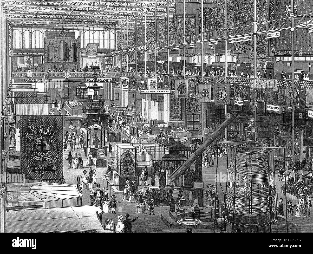 Great Exhibition of 1851 in the Crystal Palace, Hyde Park, London; interior view of the main avenue looking eastwards.  The iron framework of the building is clearly visible. Steel engraving  1851. Stock Photo