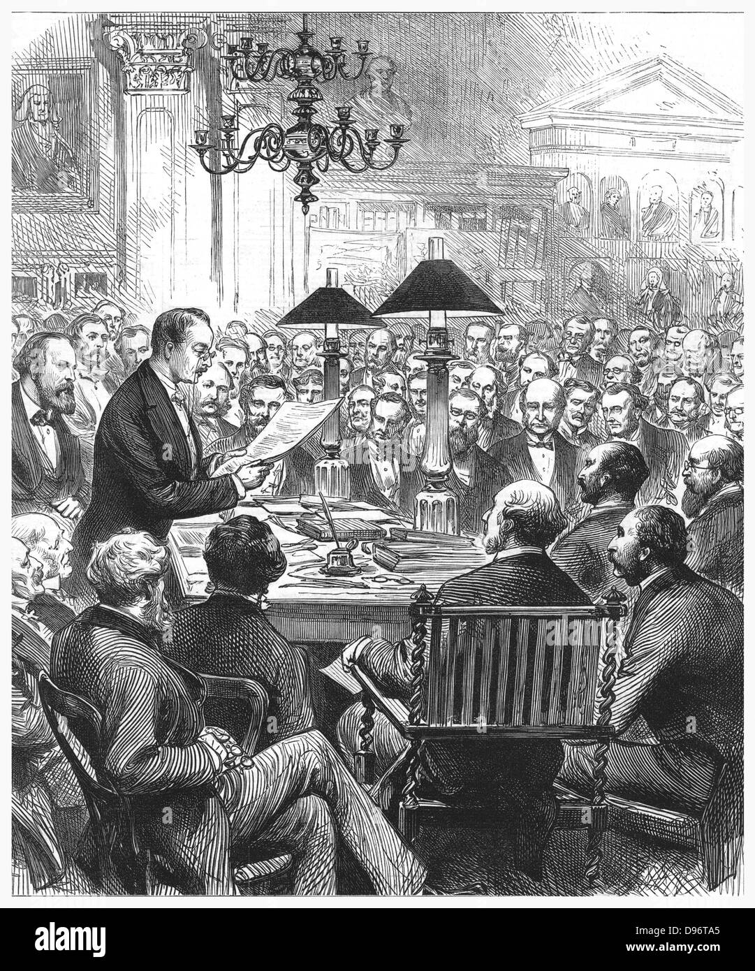 Heinrich Schliemann (1822-1890) Austrian archaeologist, lecturing to the Society of Antiquaries in their rooms at Burlington House, London, on his excavations at Mycenae. Engraving from 'The Illustrated London News', 31 March 1877. Stock Photo