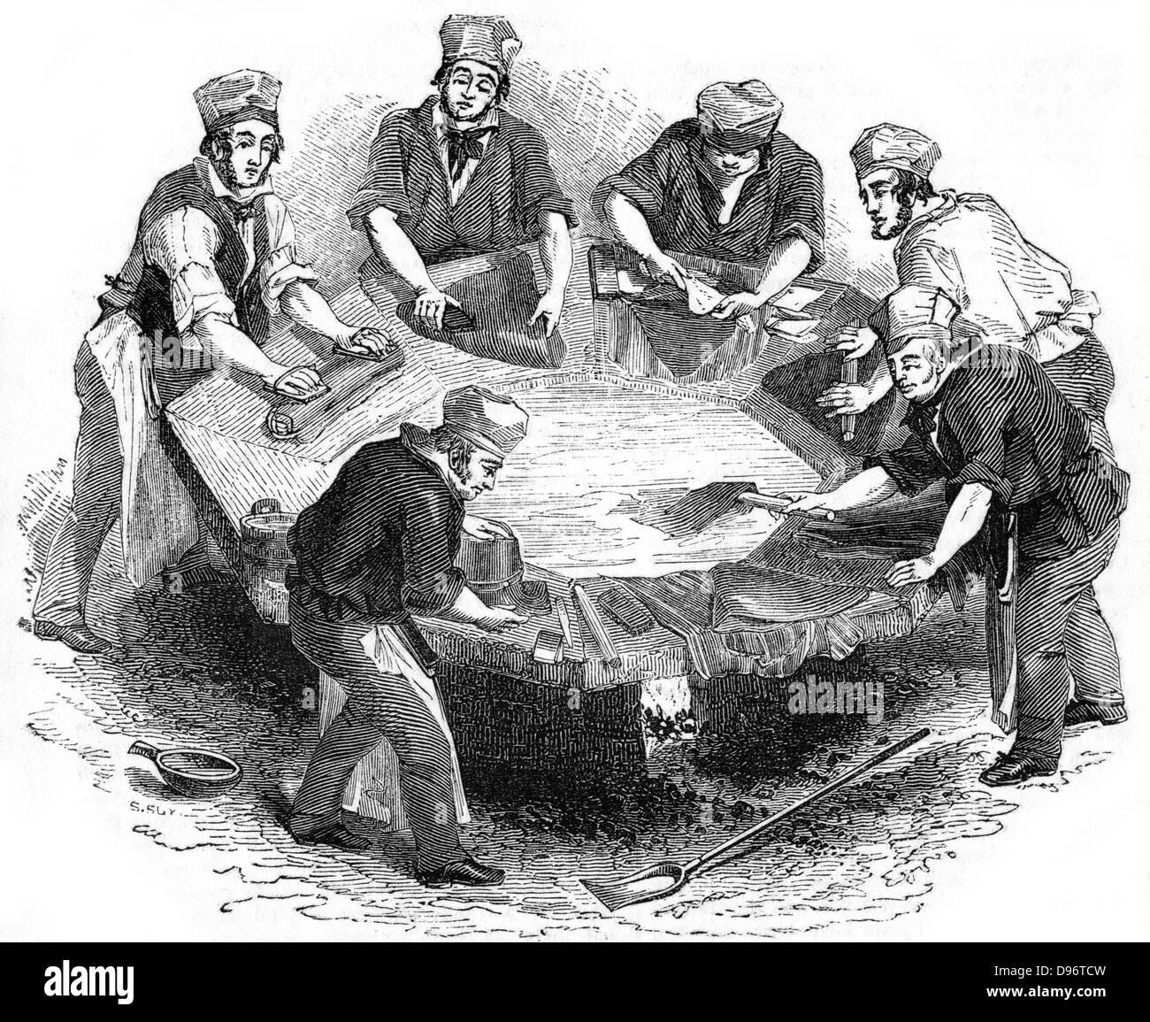 Beaver hats; 'felting' the body of the hats in the 'kettle'. Mercury was used during the manufacture and many hatters suffered from the uncontrollable shaking typical of mercury poisoning. From 'The Penny Magazine', London, 1841. Woodcut Stock Photo