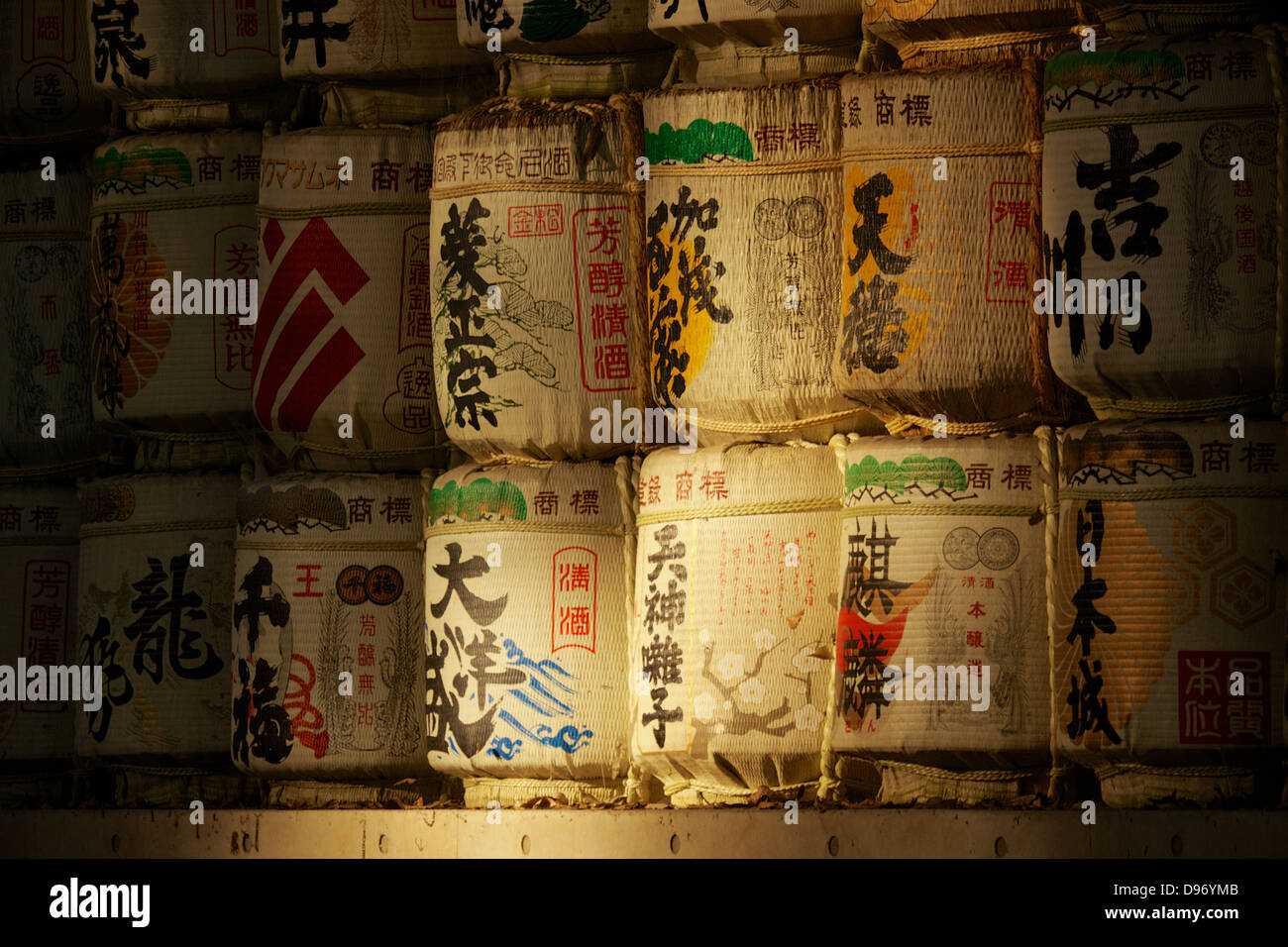 Donated Sake Barrels at Meiji Shrine, Tokyo, in evening golden glow Stock Photo