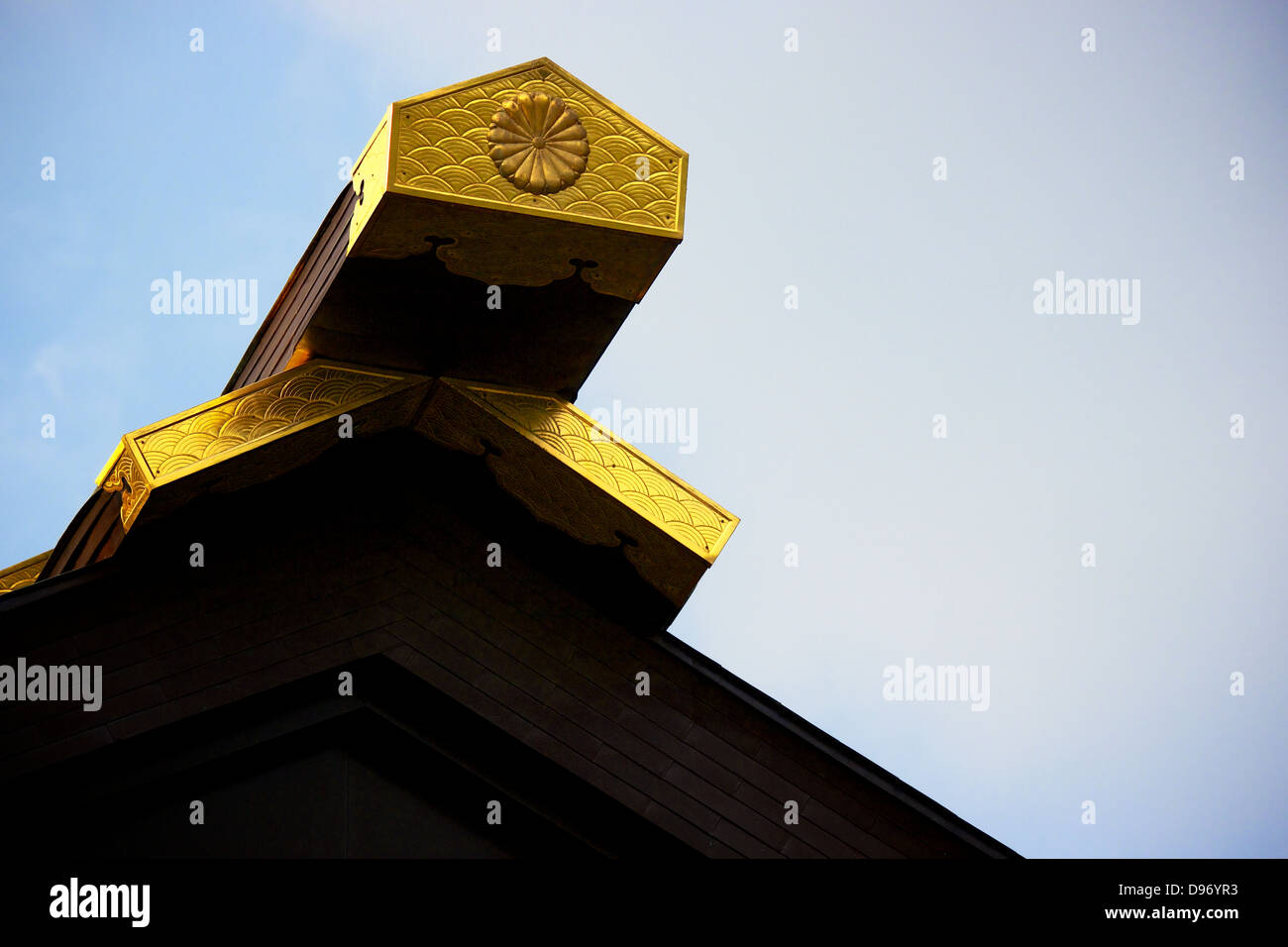 Roof of Meiji Shrine Tokyo with golden ornate tip Stock Photo