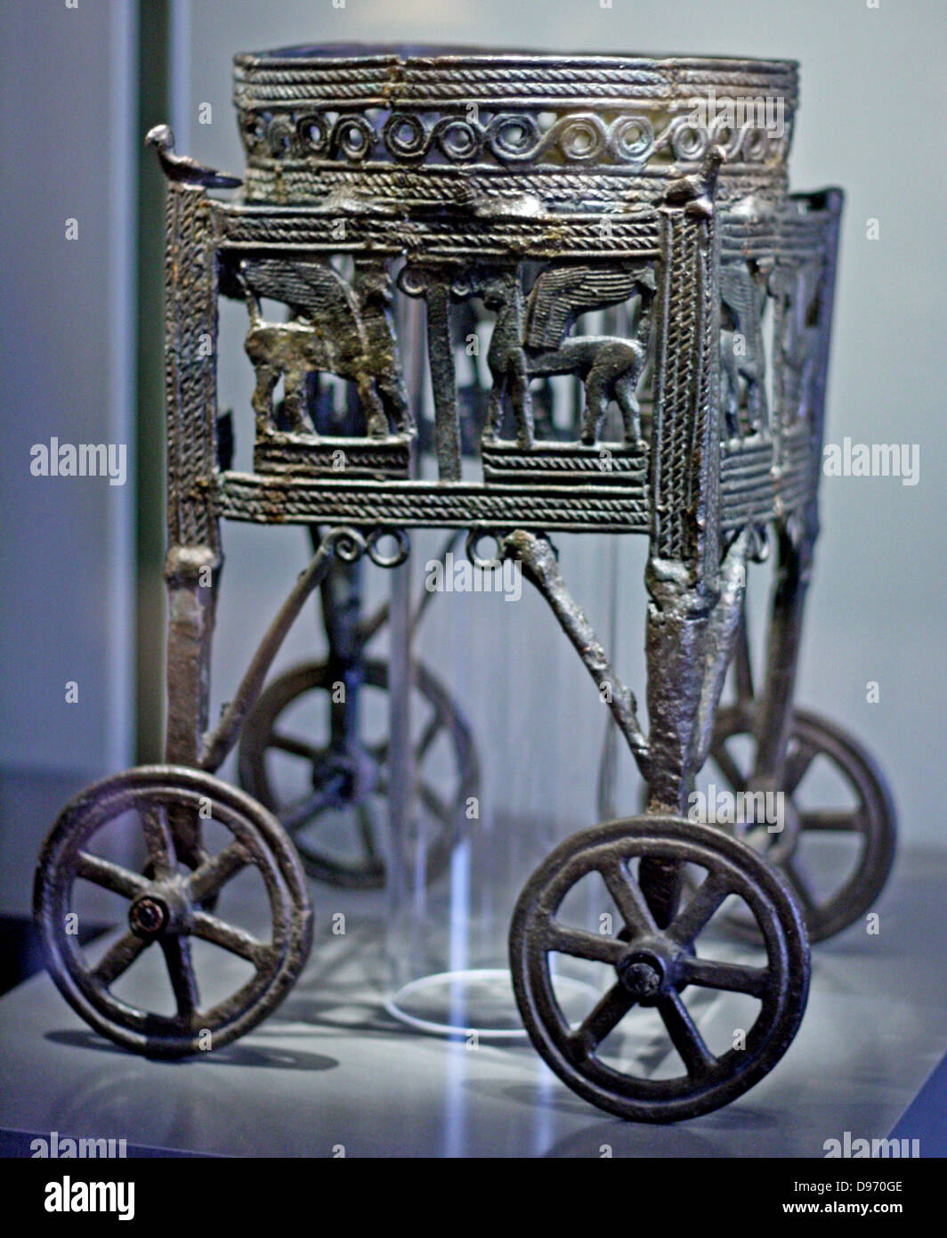 Wheeled bronze wagon built for a cauldron 12-11 th century BC from Larnaka Cyprus, Greek. Stock Photo