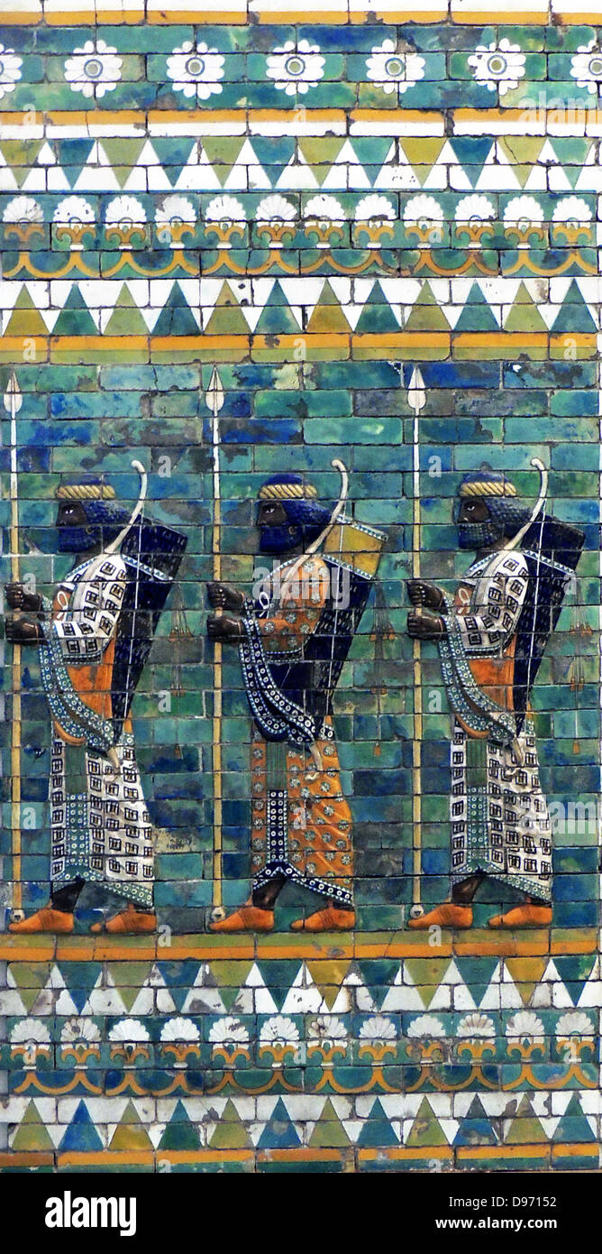 Reconstruction of the Ishtar Gates, Babylon (at the Pergamum Museum, Berlin). The gates were built in 575 BC by order of King Nebuchadnezzar II on the north side of the city. The Walls and gates depict many features including soldiers, palms, lions, dragons and aurochs. The Ishtar Gate was the eighth gate to the inner city of Babylon. Dedicated to the Babylonian goddess Ishtar, the gate was constructed using glazed brick with alternating rows of bas-relief Stock Photo