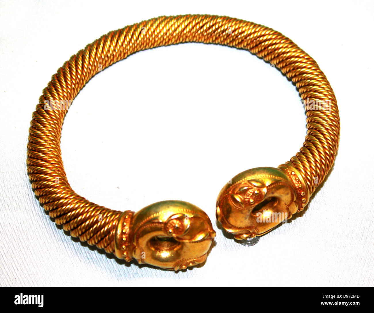 Gold and silver-alloy tore. Near Newark, Nottinghamshire. About 100-50 BC. This tore was discovered by a metal detectors' 2005. It is thought that it was deliberately placed in a specially dug hole, perhaps as an offering to the gods. Torcs were worn around the neck and were probably worn on a special occasions like a mayoral chain. Stock Photo