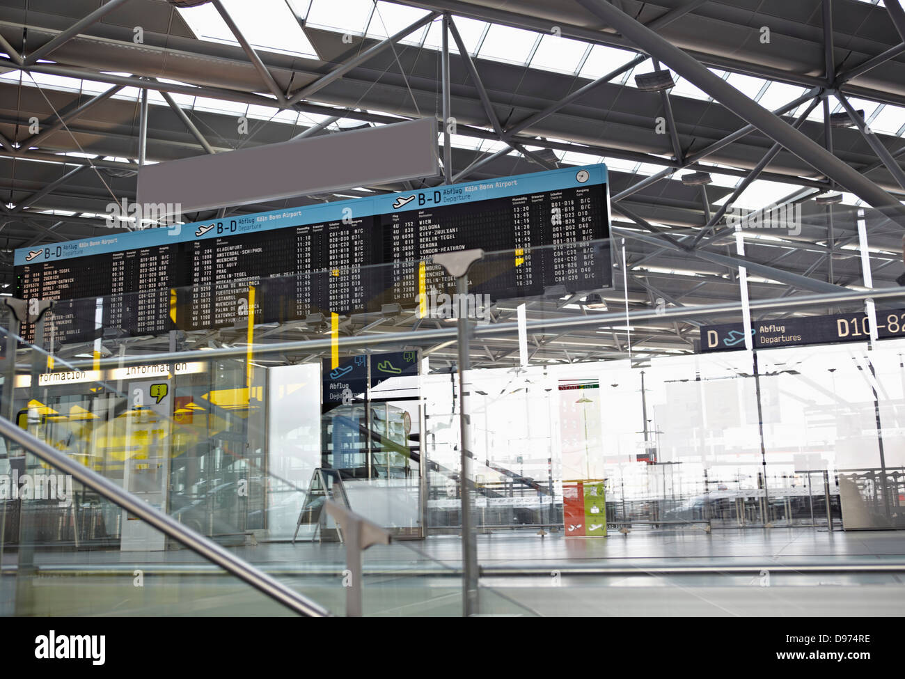 Germany, Cologne, Airport with arrival and departure board Stock Photo