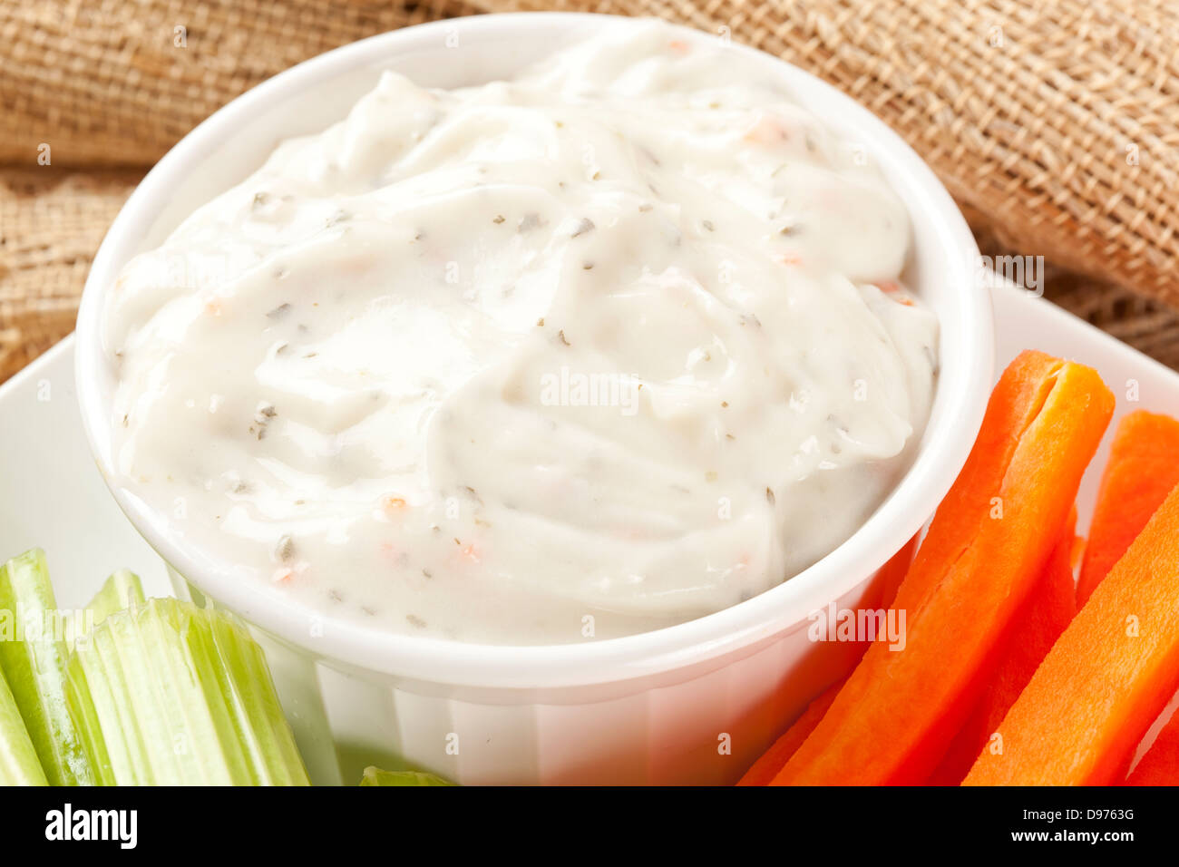 Ranch dressing with fresh carrots and celery Stock Photo Alamy