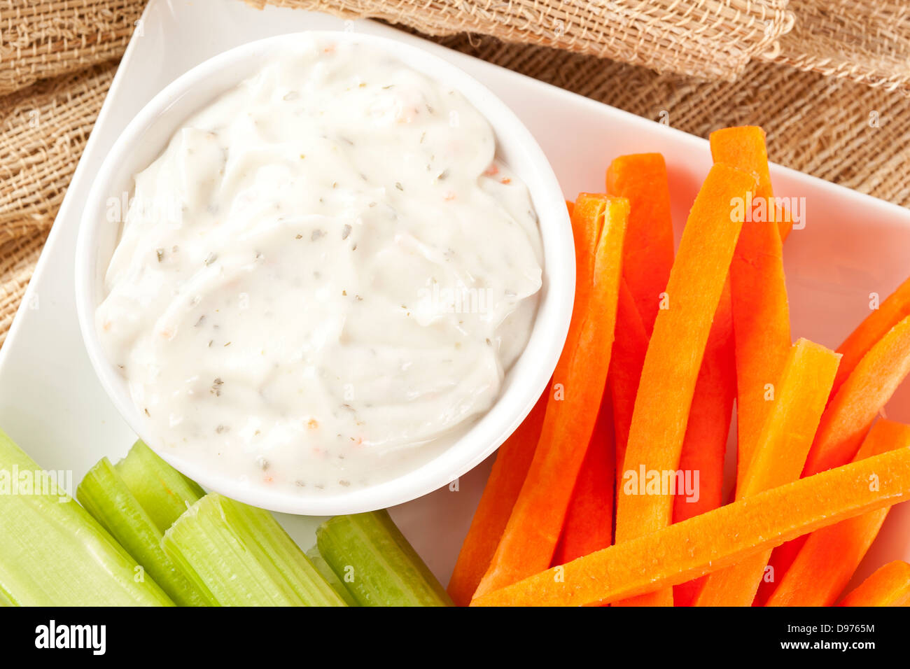 Ranch dressing with fresh carrots and celery Stock Photo Alamy