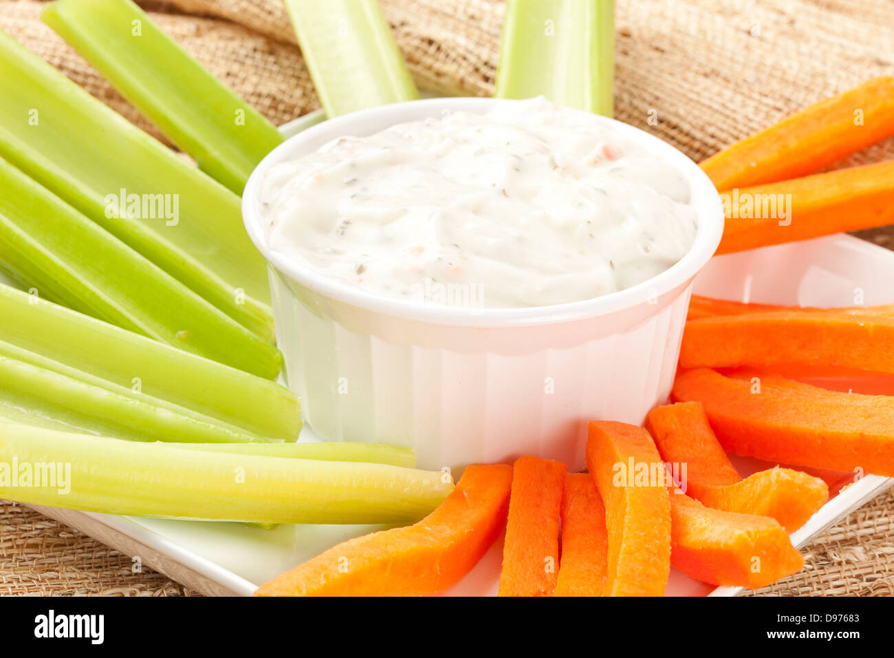 Ranch dressing with fresh carrots and celery Stock Photo Alamy