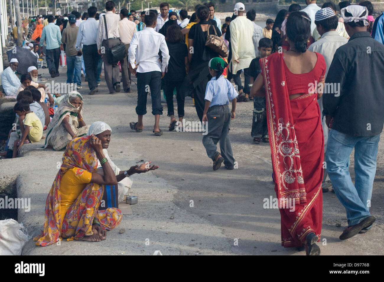 Child giving alms hi-res stock photography and images - Alamy