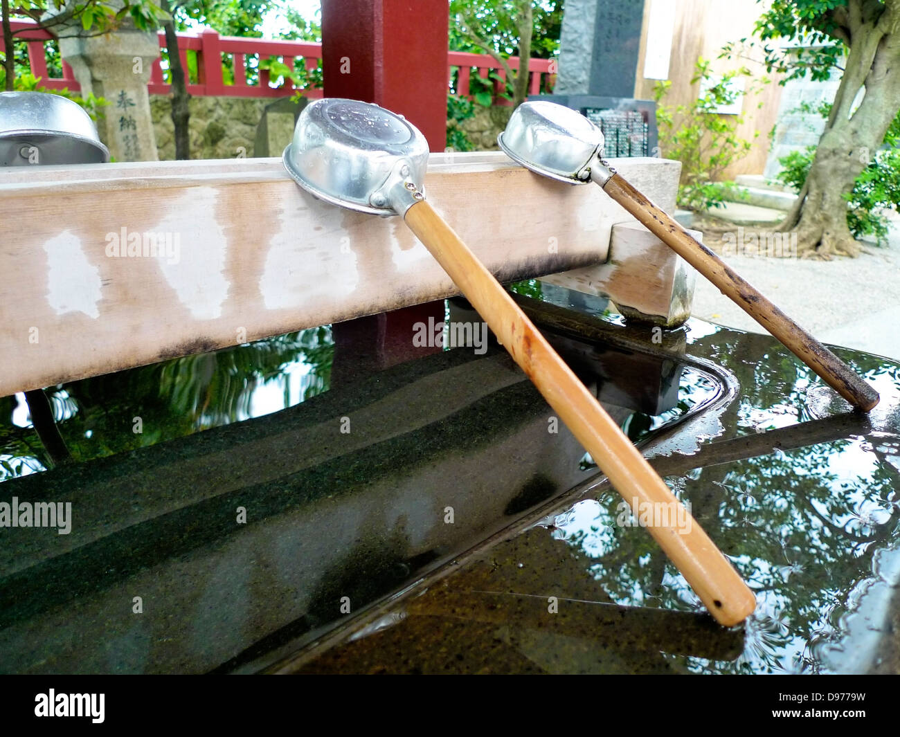 Washing utensils at a Japanese Shrine used for ritual washing, Temizu Stock Photo