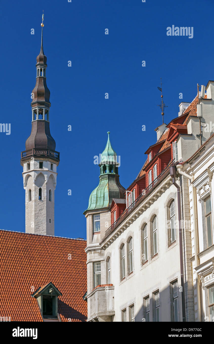 Street fragment with tall town hall tower. Old Tallinn, Estonia Stock Photo