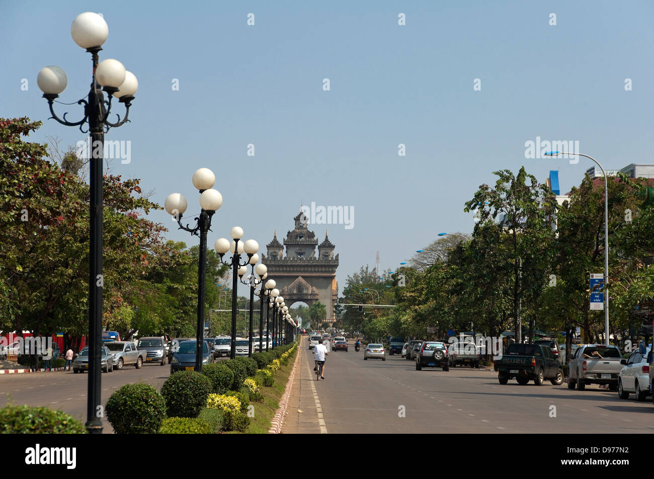 Horizontal view of the Victory Gate or Patuxai in central Vientiane on a sunny day. Stock Photo