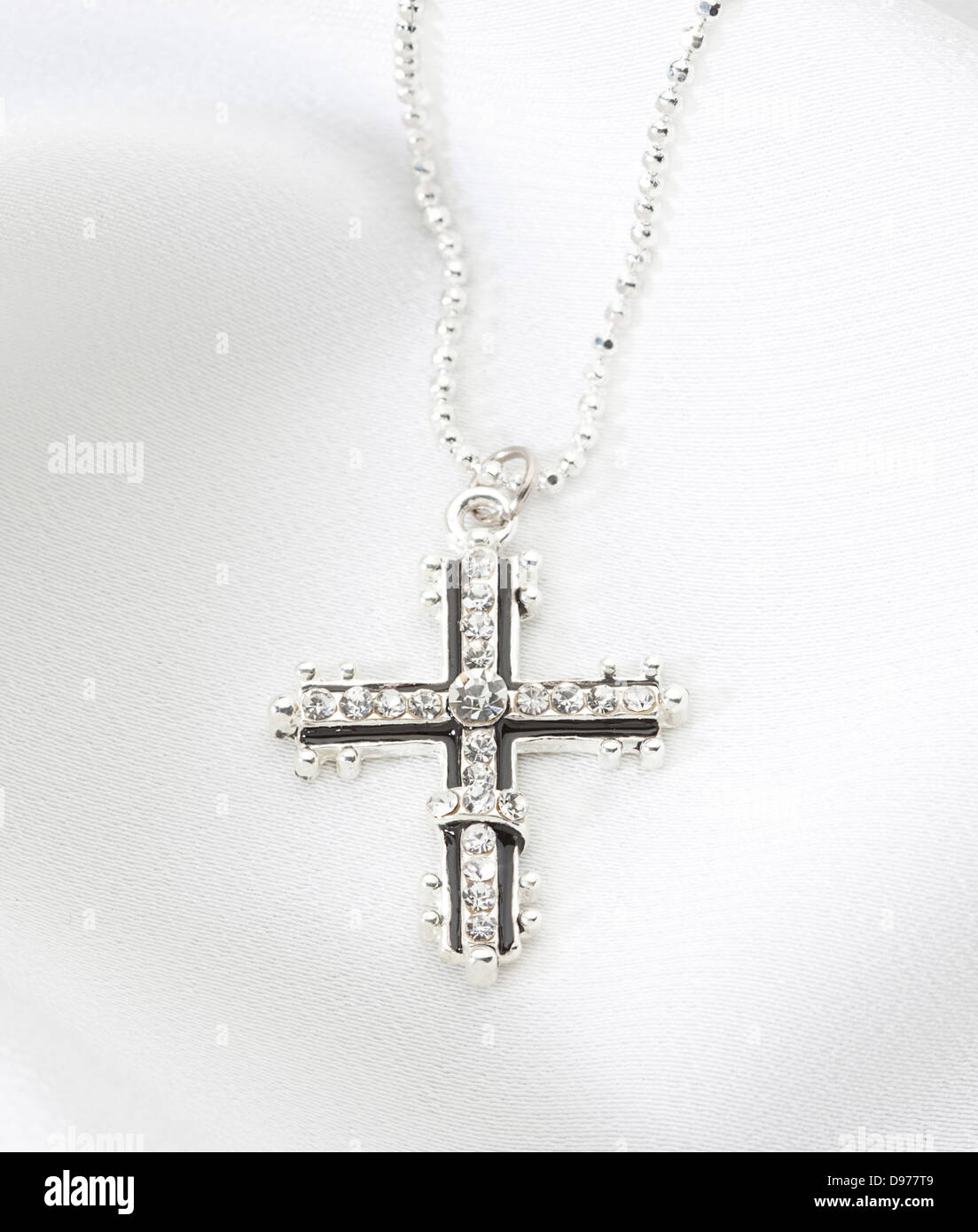 Beautiful diamond cross necklace hi res stock photography and