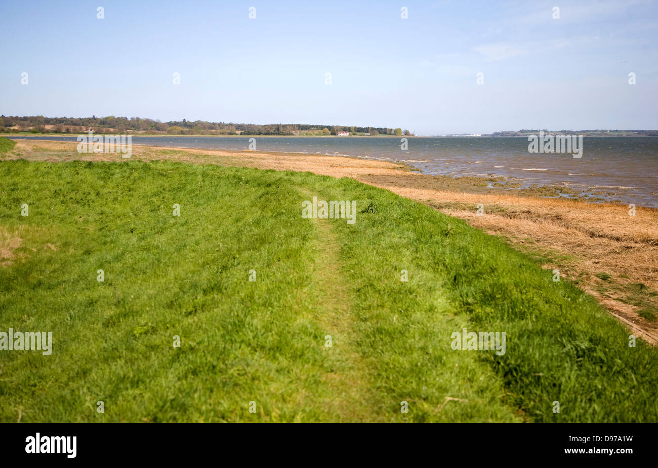 Flood defence barrier wall of River Stour at Brantham, Suffolk, England Stock Photo