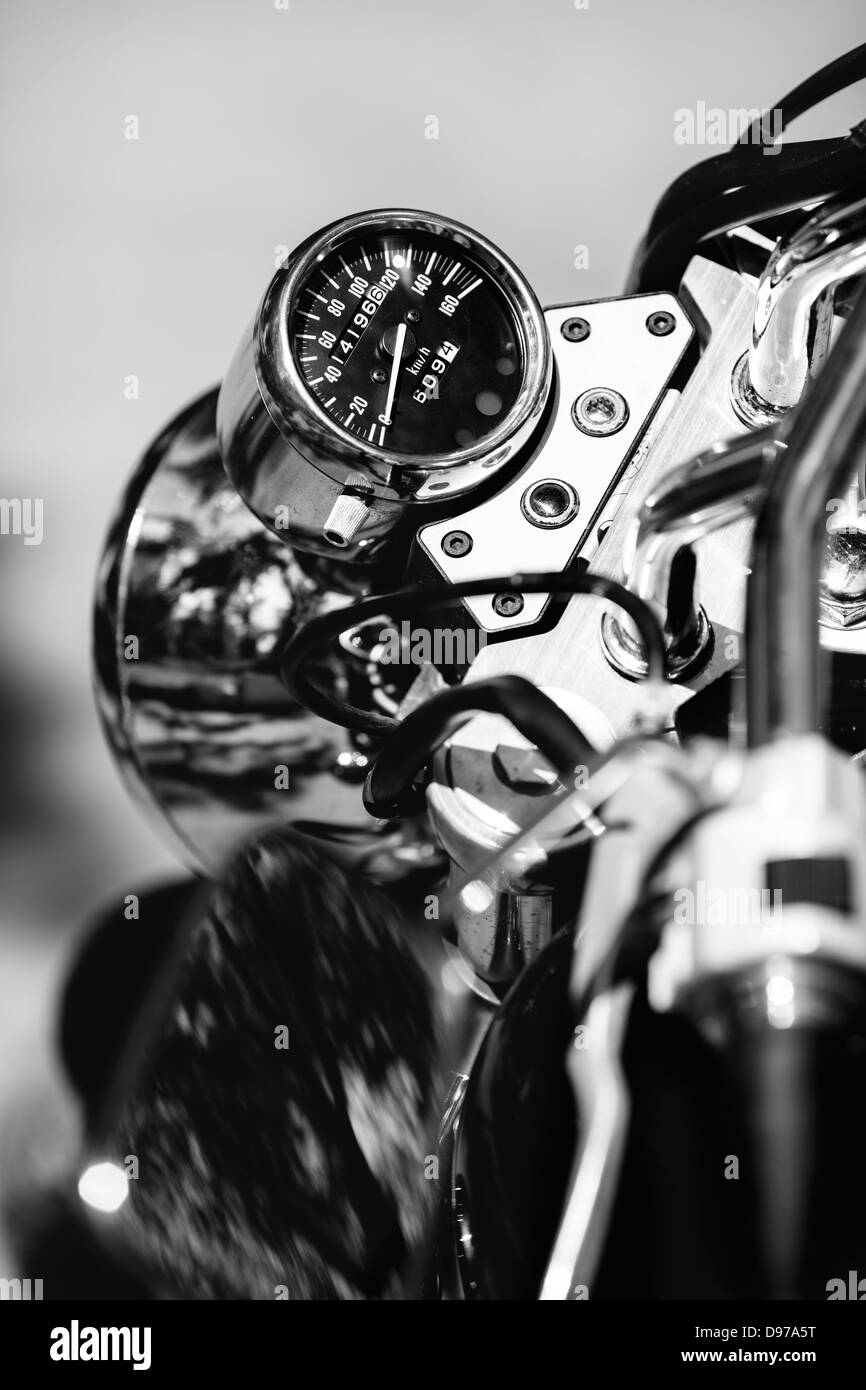 Chrome headlight and speedometer of a motorcycle Stock Photo Alamy