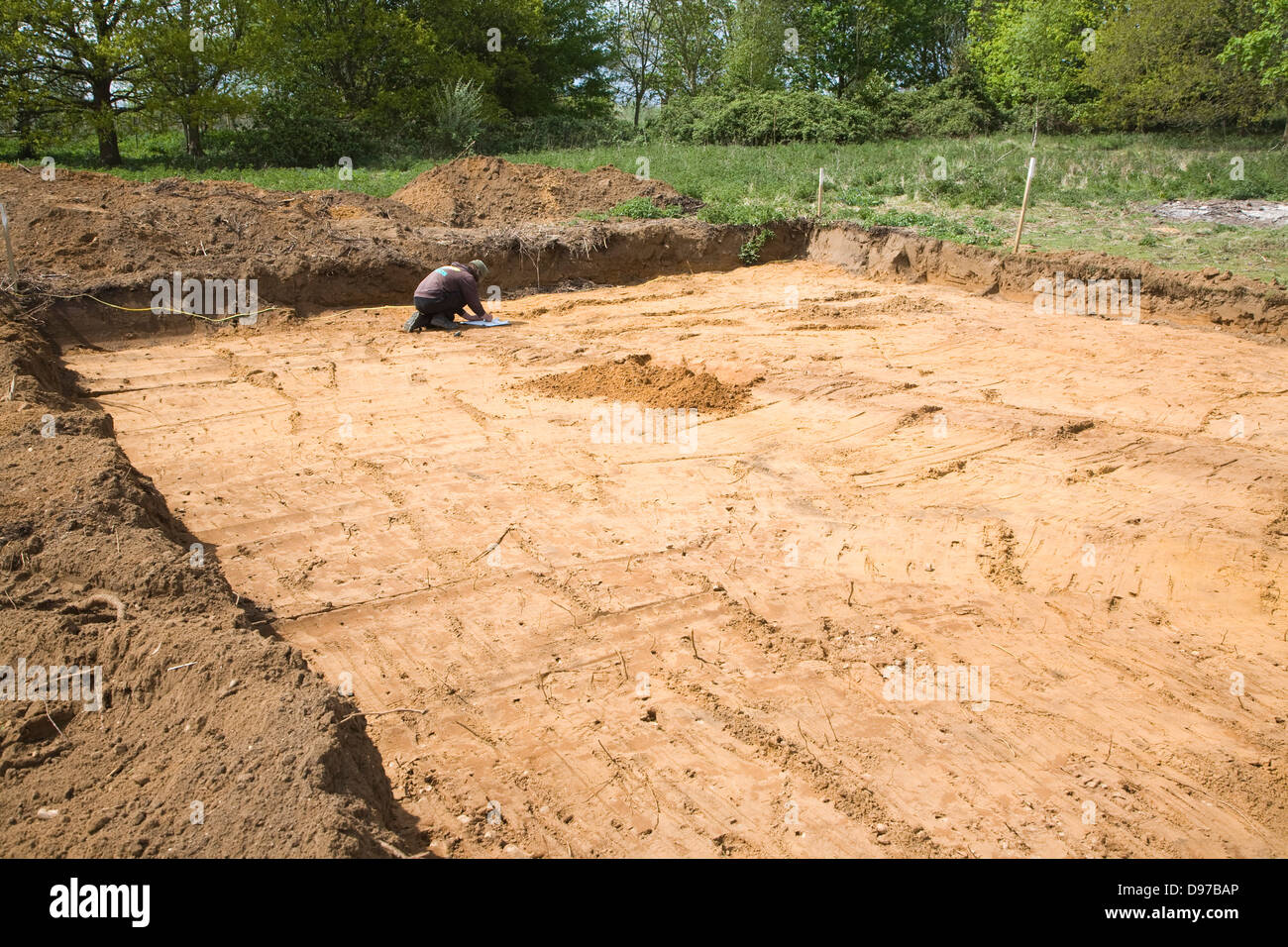 Archaeologists discover prehistoric field boundary ditch during excavation on new building plot, Shottisham, Suffolk, England Stock Photo
