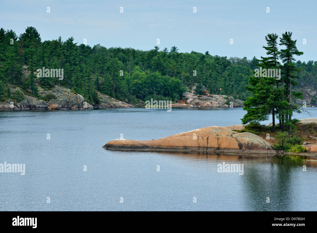 White pines rocks and summer cottages along the Key River Key River