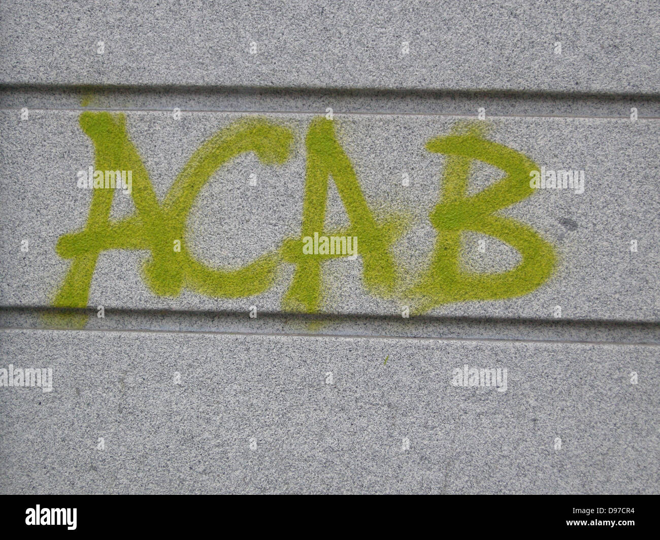 ACAB, (All Cops Are Bastards) graffiti on the wall of a police station in central Madrid, Spain. Stock Photo