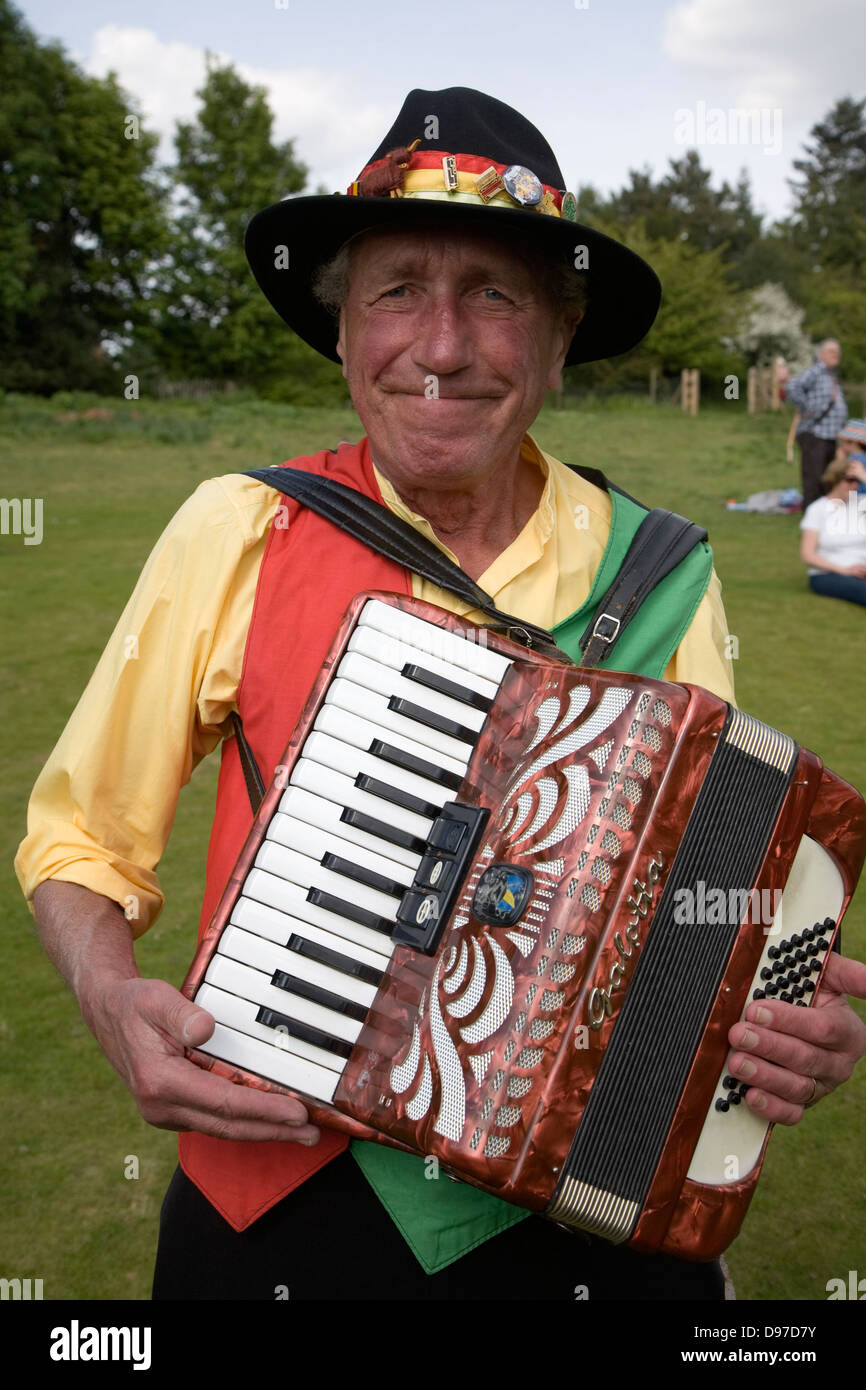 Portrait of accordion player for Morris dancers at country folk event, Shottisham, Suffolk, England Stock Photo