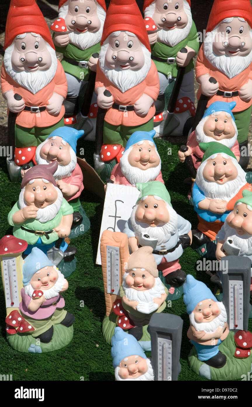 Colourful garden gnomes lined up for sale, UK Stock Photo Alamy