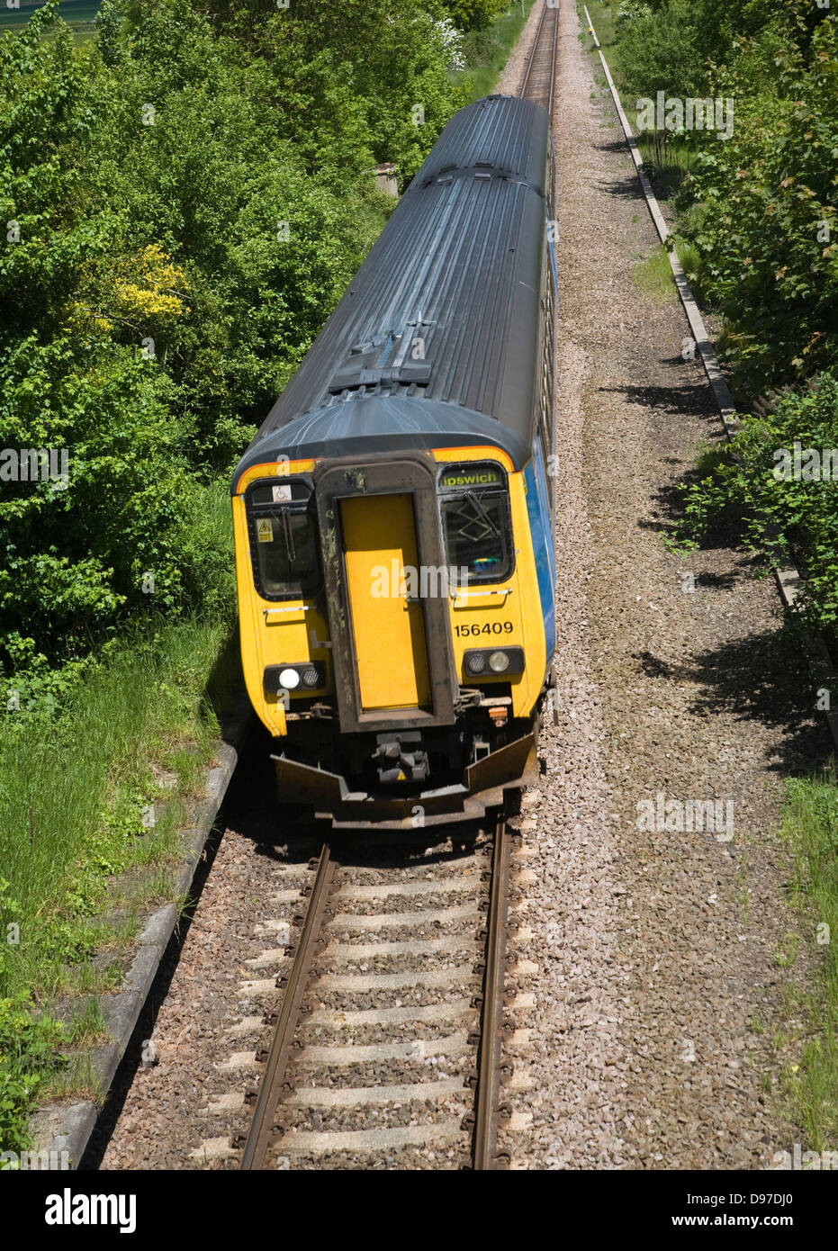 Diesel train on the East Suffolk railway line between Lowestoft and Ipswich, Suffolk, England Stock Photo