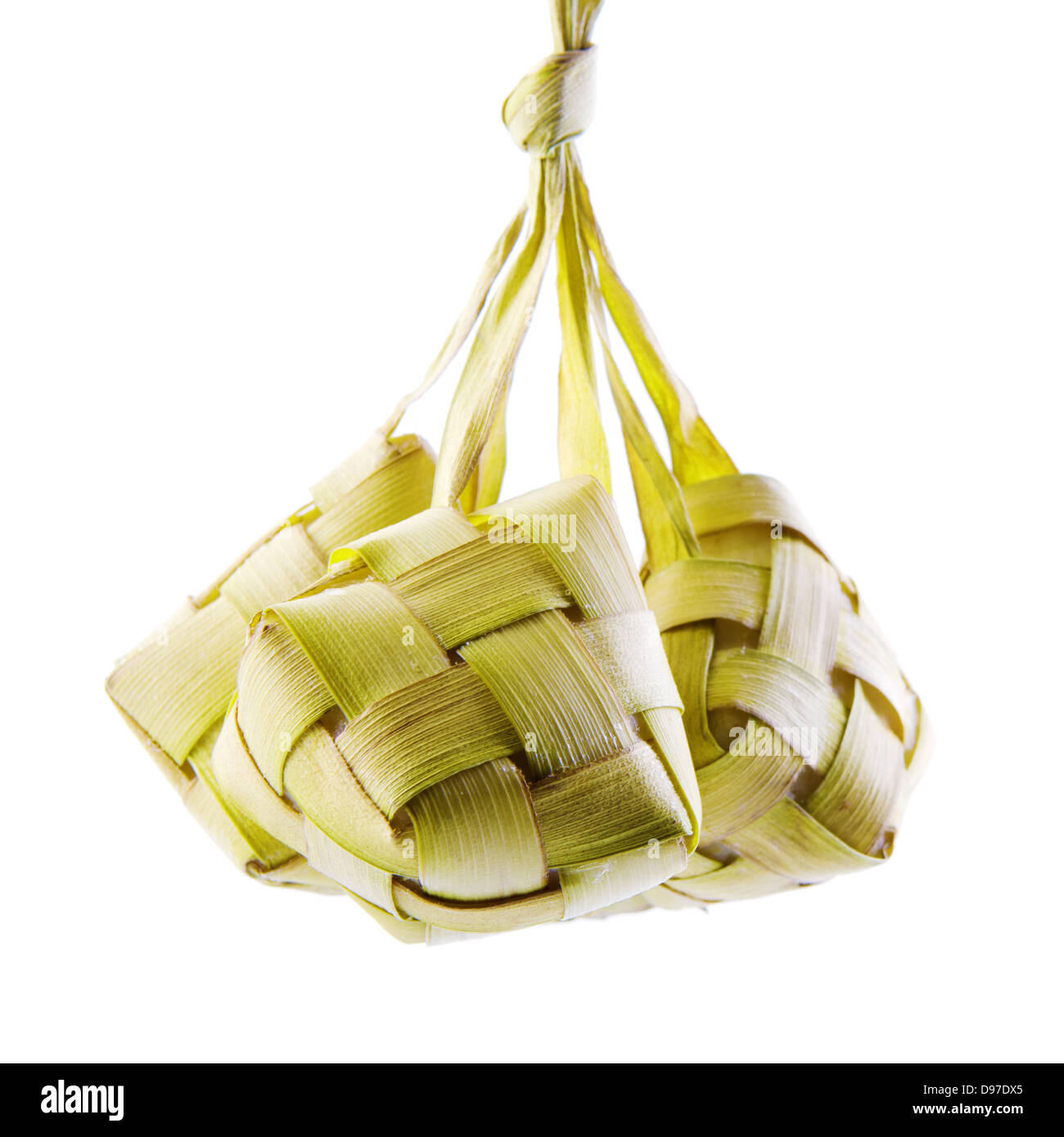 Ketupat Or Packed Rice Dumpling Traditional Malay Ramadan Food Popular Malaysian Food Isolated On White Background Stock Photo Alamy