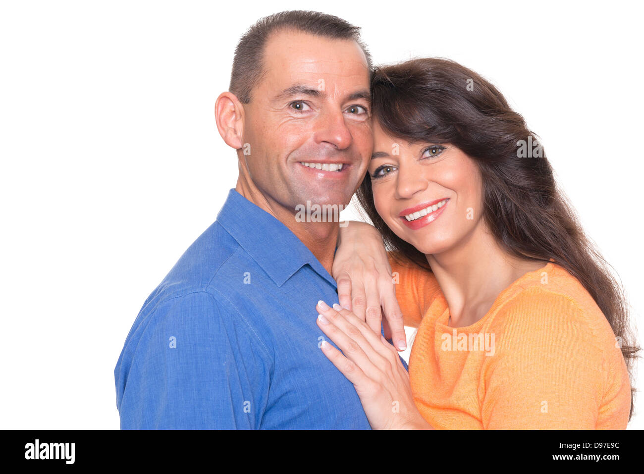 Happy couple in front of white background Stock Photo - Alamy