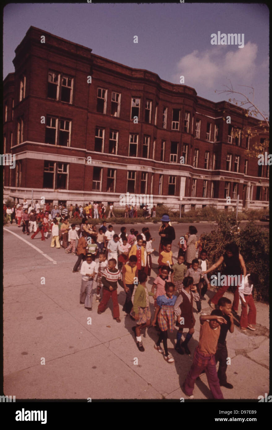 Youngsters Returning To Class Following A Fire Drill In A Chicago Elementary School, 10/1973 Stock Photo