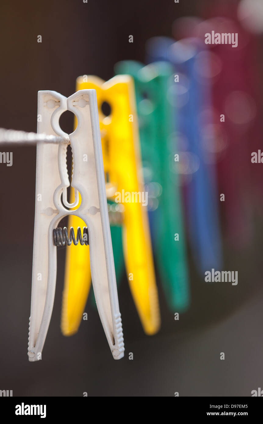 Selection of plastic laundry pegs Stock Photo