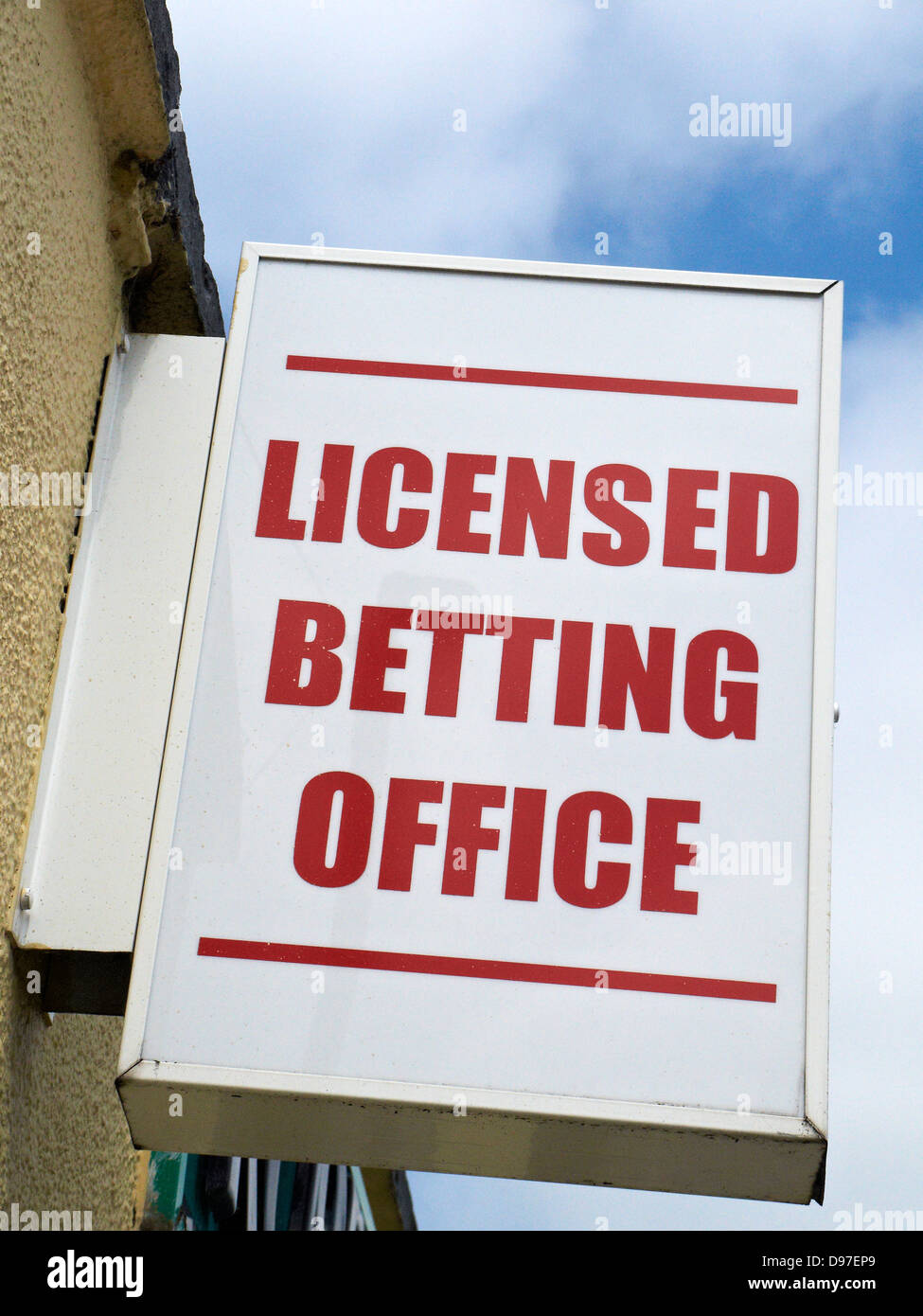 Licensed betting office sign on outside wall UK Stock Photo