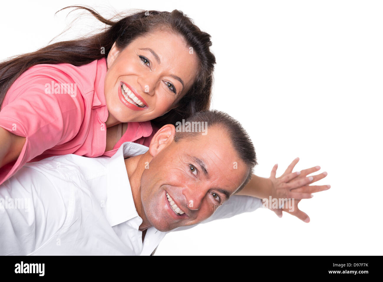 Happy couple in front of white background Stock Photo - Alamy