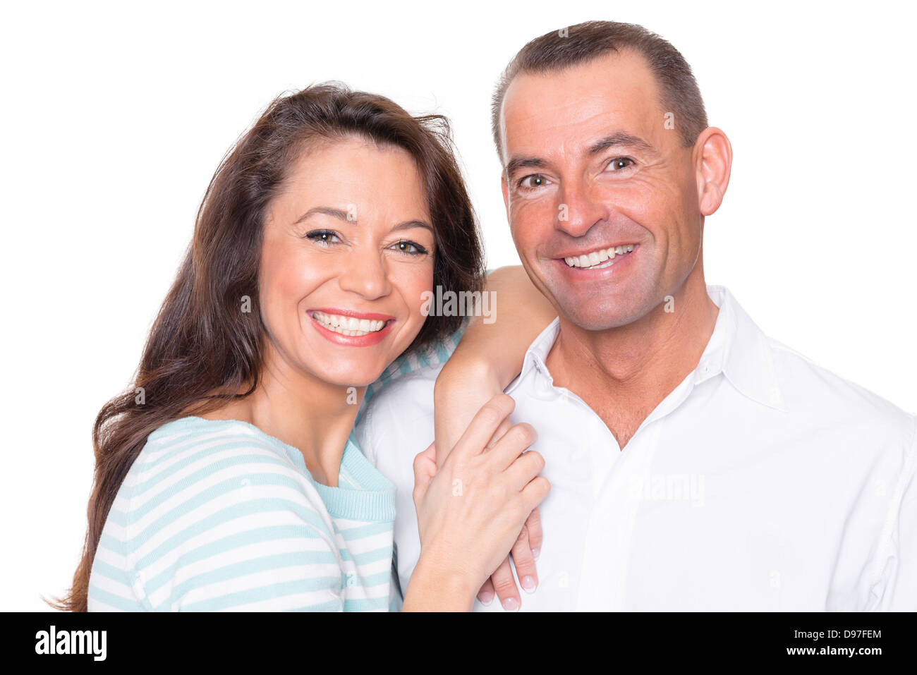Smiling couple in front of white background Stock Photo - Alamy