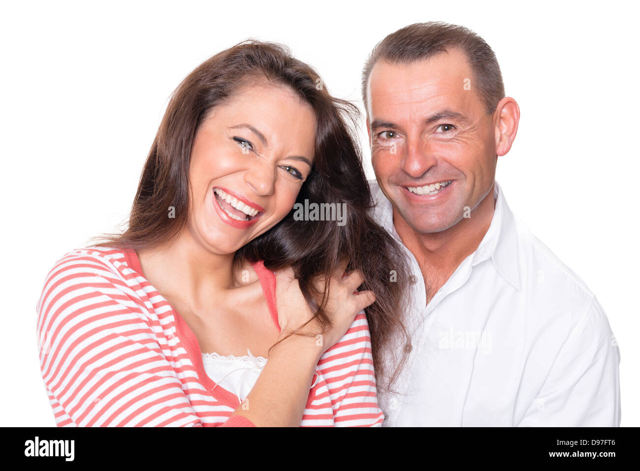 Smiling couple in front of white background Stock Photo - Alamy
