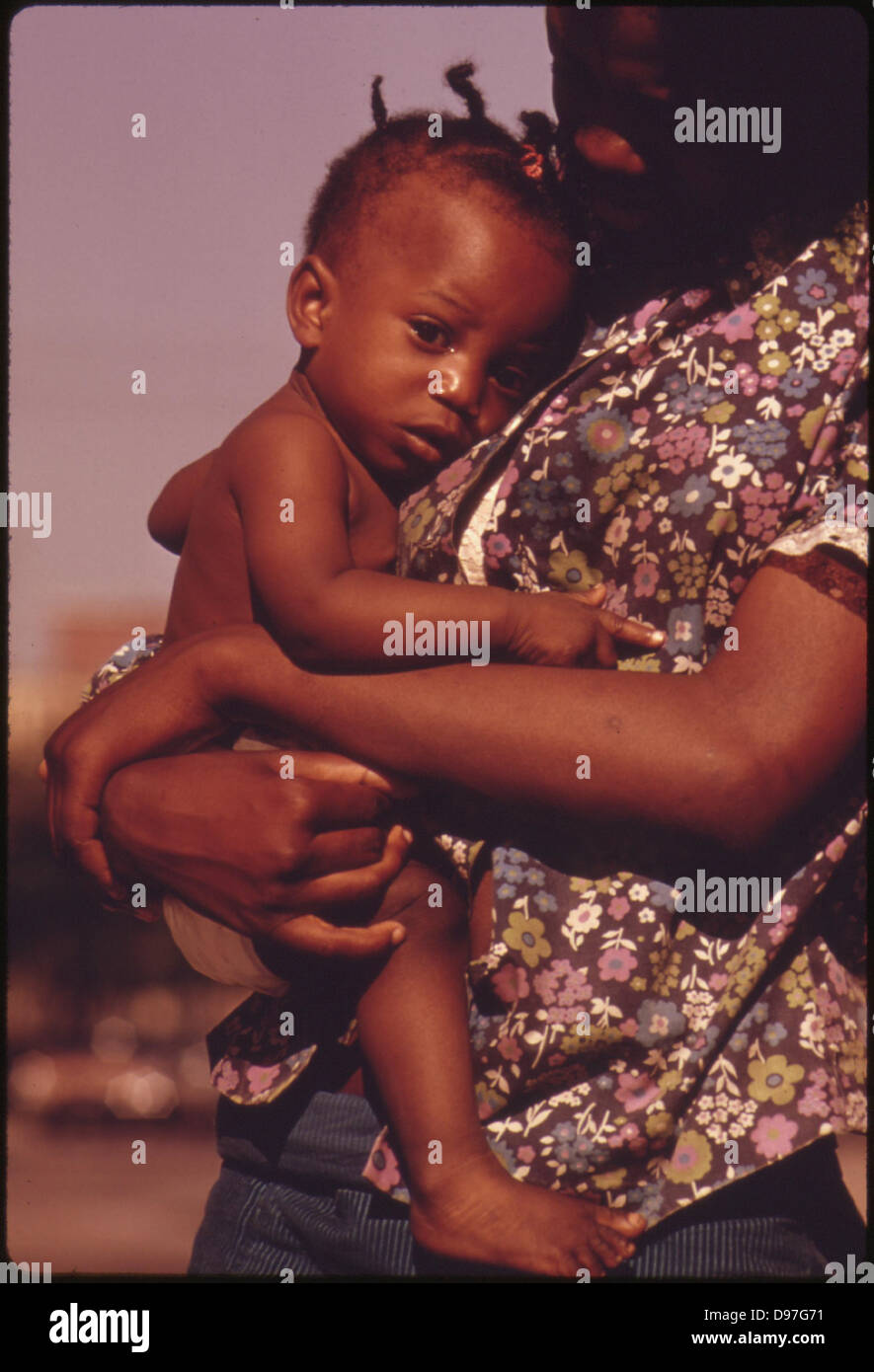 A South Side Chicago Ghetto Mother And Child Who Live In Nearby Low Income Housing, 06/1973 Stock Photo